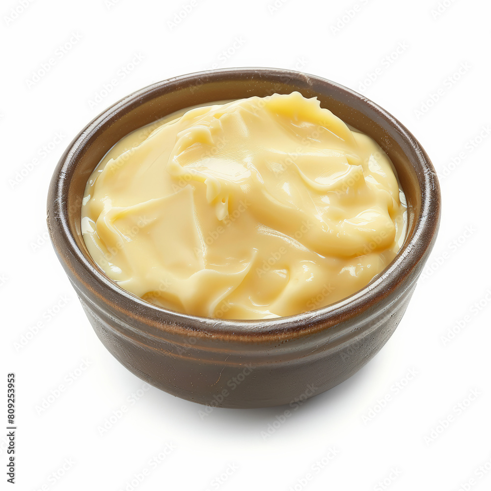 A bowl of Moose Cheese, creamy and rare, isolated on a white background A bowl of Moose Cheese, creamy and rare, isolated on a white background