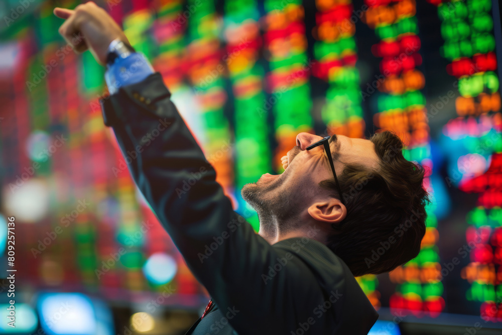 Fototapeta premium Professional businessman celebrating success raising fists happy about financial bank market growth