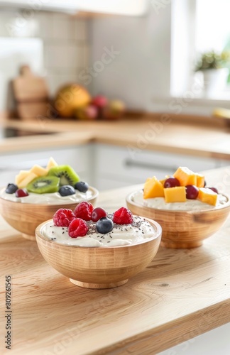 Fresh fruit and yogurt parfaits in wooden bowls on a kitchen countertop  a healthy and delightful breakfast choice