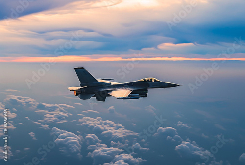 Military fighter jet flying high in the sky photo