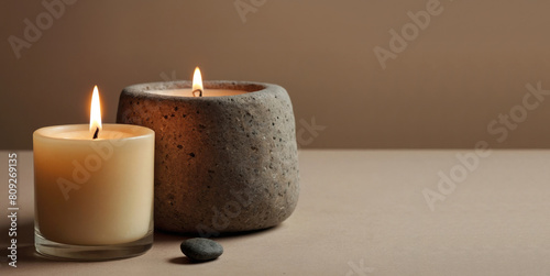 spa background with candles on empty beige table top