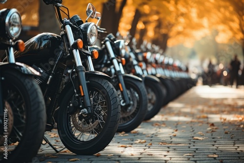 A serene autumn scene with motorcycles lined up under golden fall foliage