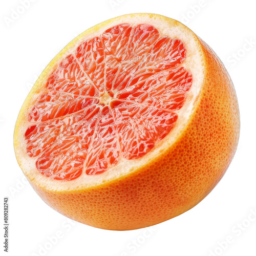 A slice of grapefruit is shown with its skin and seeds removed. The fruit is bright orange and has a slightly bitter taste