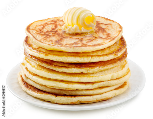 Stack of pancakes with butter swirl on top on white plate. PNG transparent background.