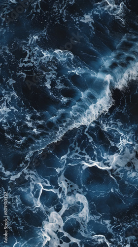 Churning dark blue sea waves from above