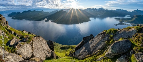 Panorama, view of Fjord Raftsund and mountains in the evening light, sun star, view from the summit of Dronningsvarden or Stortinden, Vesteralen, Norway, Europe