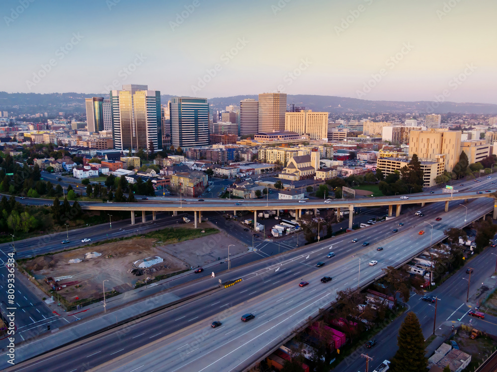 Downtown oakland and interstate 880 freeway at sunset, California, United States of America.