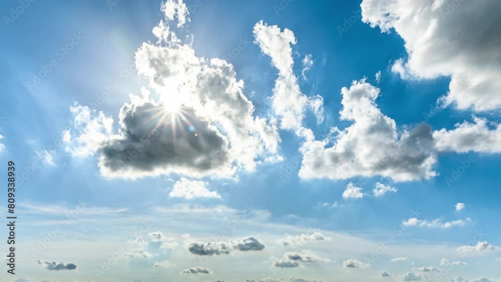 White clouds and sun nature landscape on a sunny day. Beautiful natural background. 4K Sky Time lapse.