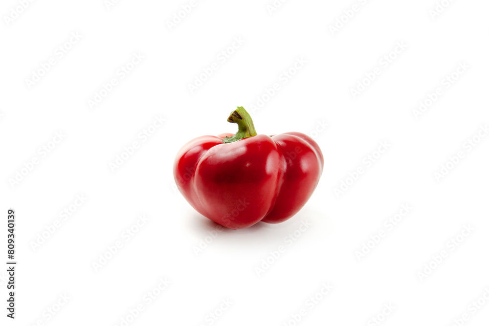Whole red bell pepper isolated on white background with clipping path. . Whole red bell pepper isolated on white background with clipping path. .