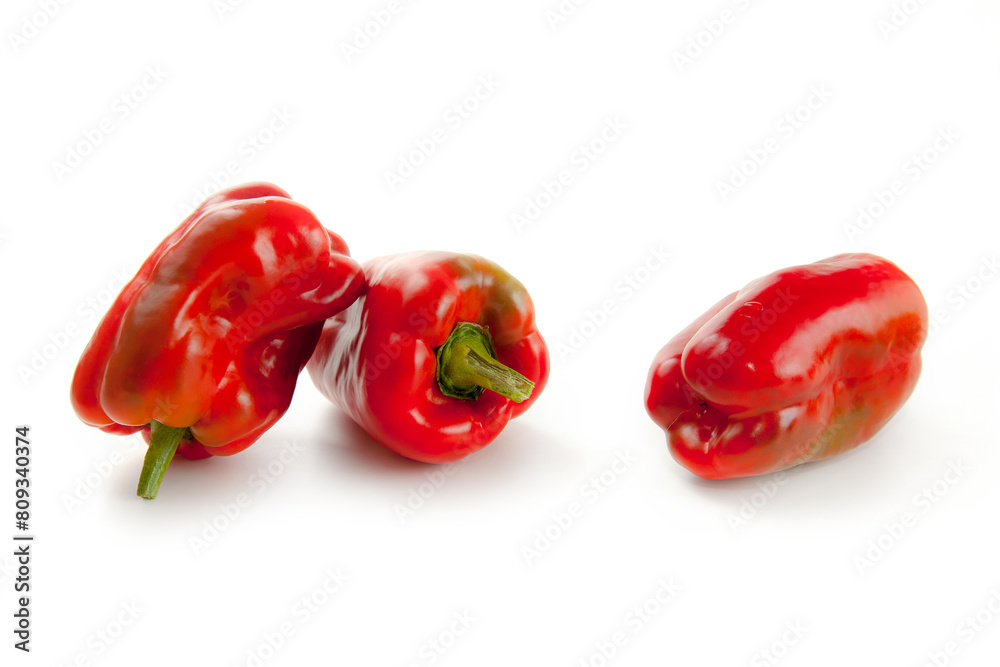 Three red bell pepper isolated on white background with clipping path. . Three red bell pepper isolated on white background with clipping path. .
