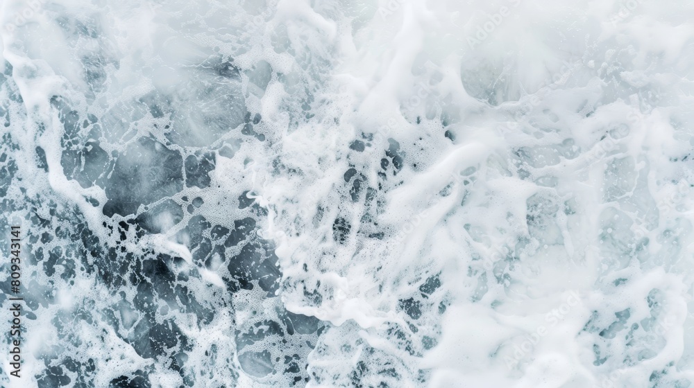 Naklejka premium Captivating aerial shot of chaotic sea foam patterns, showcasing the intense power of the ocean during a tumultuous swell, perfect for dynamic backgrounds or nature-themed designs