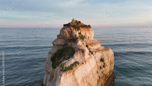 Two seagulls on the top of limestone cliff. Praia dos Tres Castelos, Portugal photo