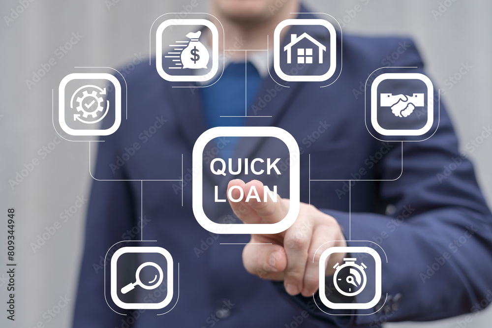 Business man working on virtual touch screen presses inscription: QUICK LOAN. Concept of quick and easy loan, fast money providence, business and finance services. Timely payment. Easy instant credit. Business man working on virtual touch screen presses inscription: QUICK LOAN. Concept of quick and easy loan, fast money providence, business and finance services. Timely payment. Easy instant credit.