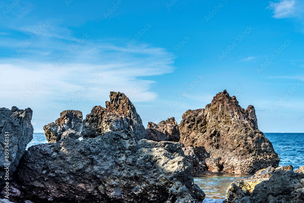Rock and Blue Sea at Tulamben Beach Bali 