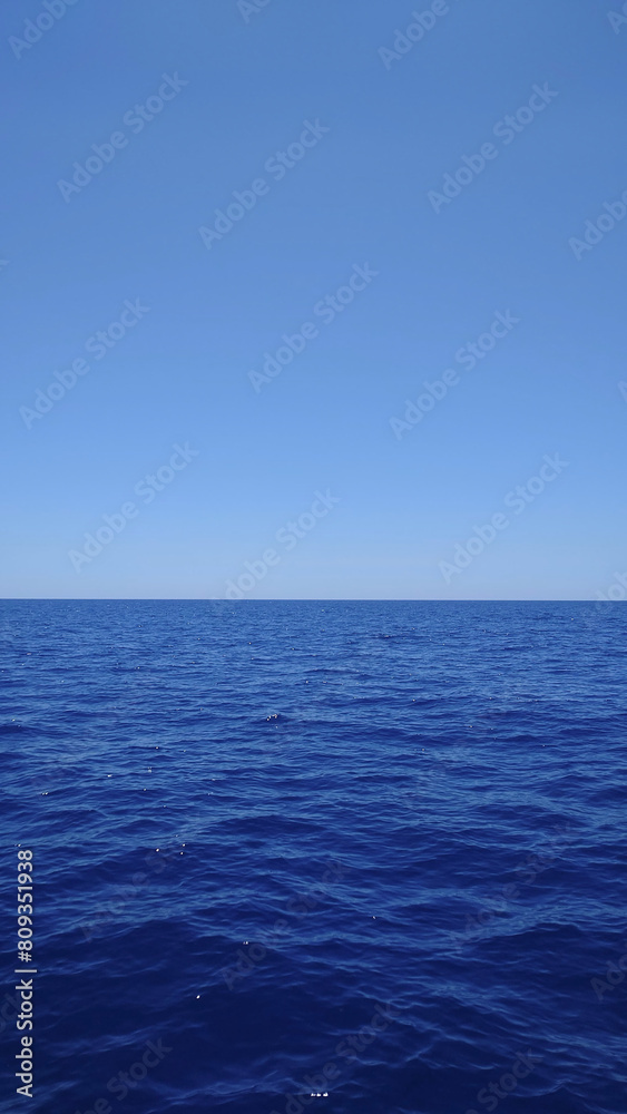 Minimalist photo of endless blue sea and sky