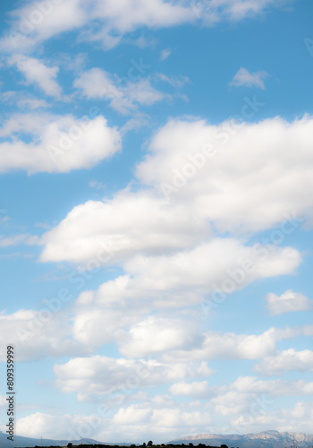 Expansive Sky Over Mountainous Horizon