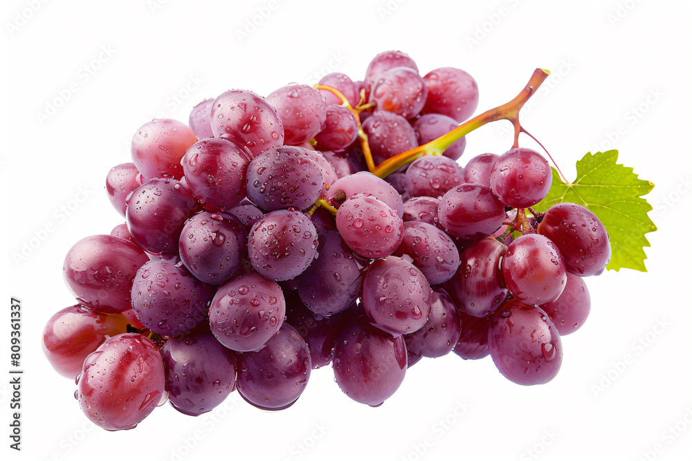 a bunch of grapes with a leaf on top