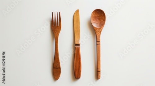 Wooden cutlery set with a fork  knife  and spoon on white background  Ai Generated