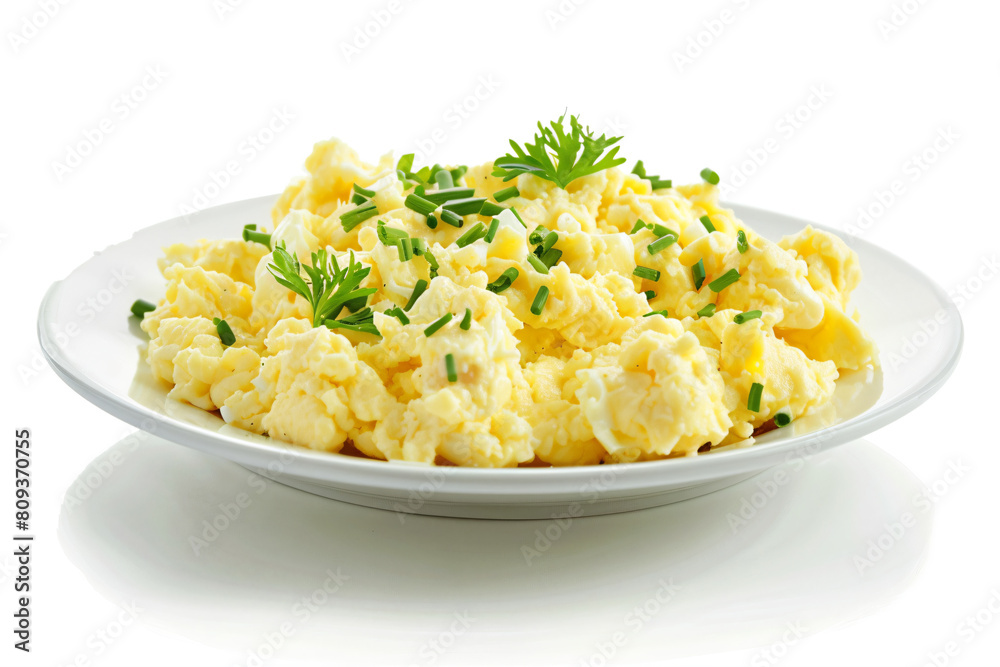 a plate of scrambled eggs with parsley a plate of scrambled eggs with parsley