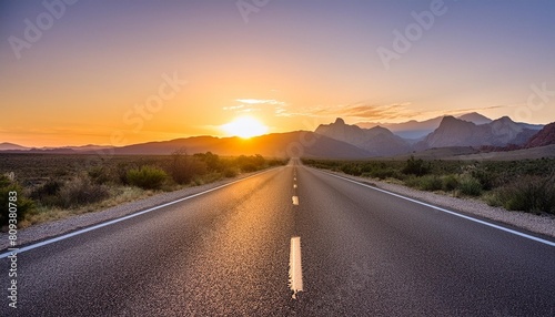 a long road with the sun setting in the distance and mountains in the background generative ai © Josue