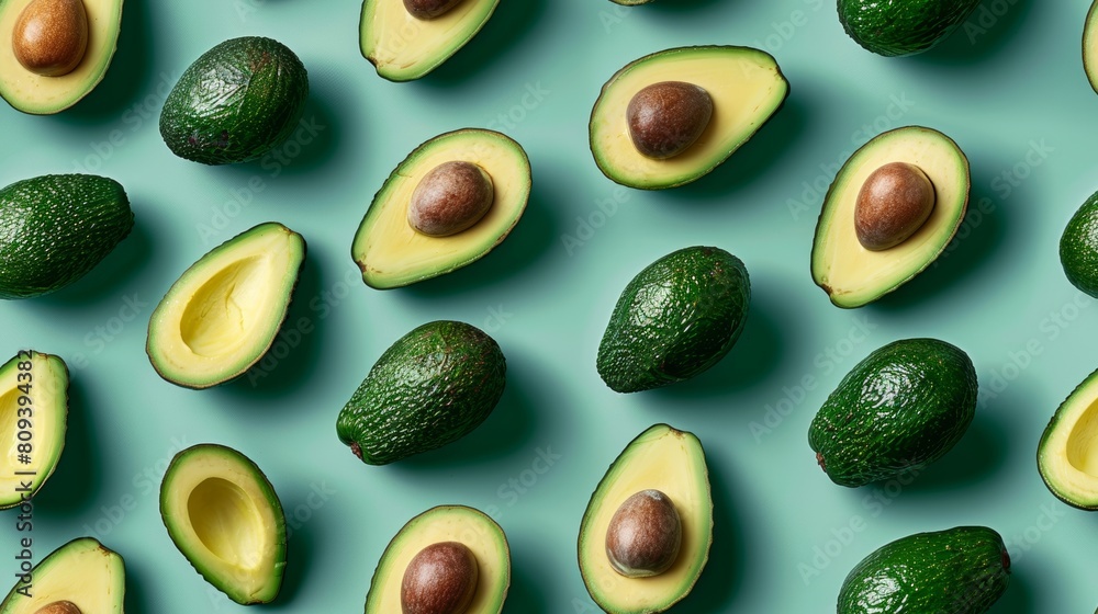 Detailed close-up of whole and sliced avocados, artistically patterned on a vibrant cyan background, under perfect studio lighting Detailed close-up of whole and sliced avocados, artistically patterned on a vibrant cyan background, under perfect studio lighting