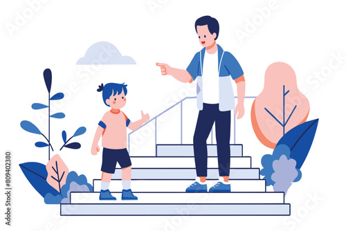 Adult male points the way for a young boy on steps