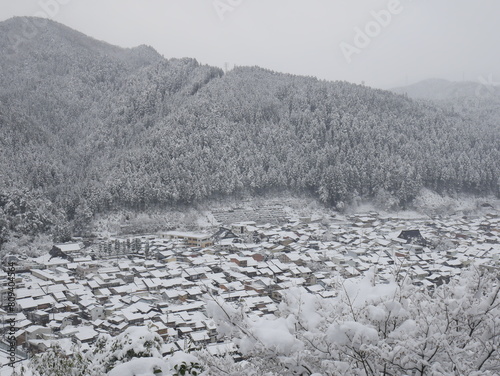 JAPAN : Aerial view of North East area of Japan in December winter season. View of snow covered land. Houses, street and road covered with heavy snow. Winter travel and journey concept shot