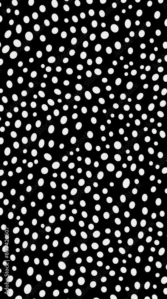 Black and white image showing white dots scattered across a dark background