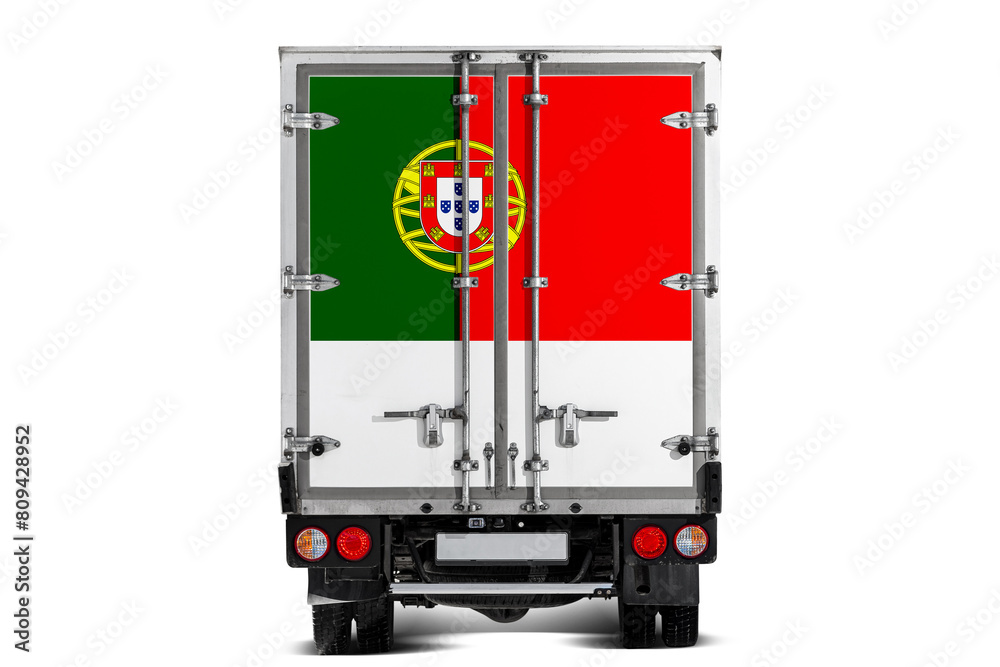 A truck with the national flag of Portugal depicted on the tailgate drives against a white background. Concept of export-import, transportation, national delivery of goods A truck with the national flag of Portugal depicted on the tailgate drives against a white background. Concept of export-import, transportation, national delivery of goods