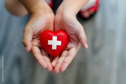 world red cross day, adult and child hands holding red heart, healthcare, love and family insurance concept