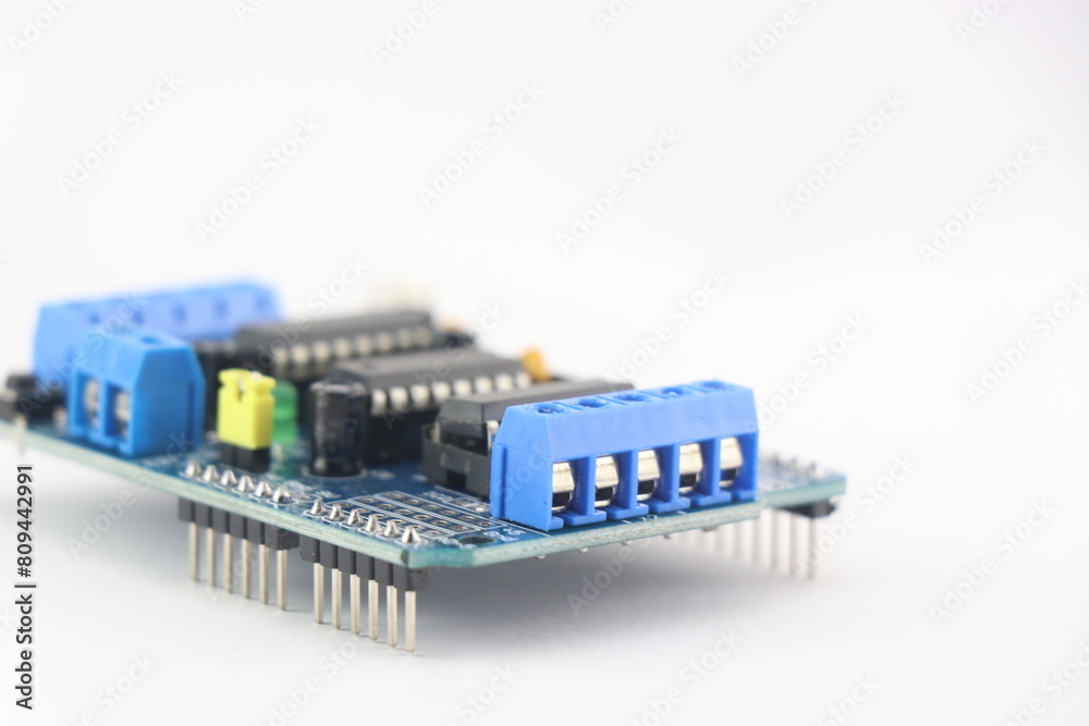 servo driver module shield that enables servo motor and stepper motors to be connected to the micro controller isolated on white background servo driver module shield that enables servo motor and stepper motors to be connected to the micro controller isolated on white background