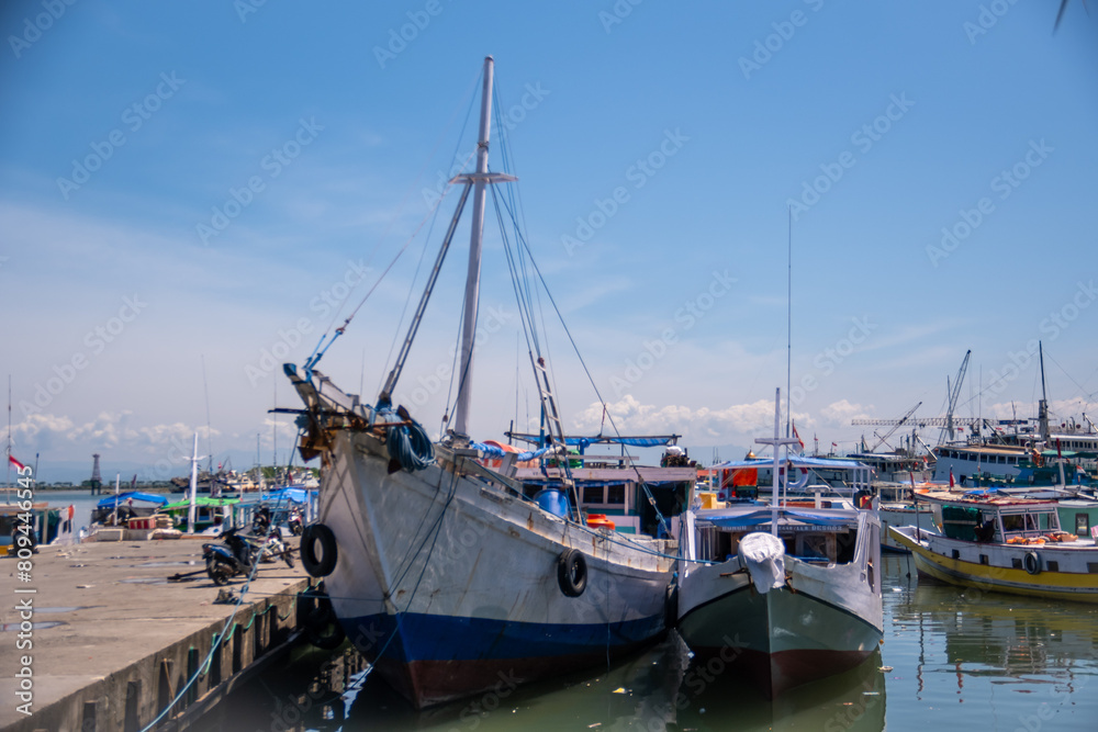 Wooden boats anchor at Paotere Traditional Harbor, Makassar, South Sulawesi, Indonesia