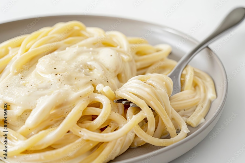 Creamy and Velvety Alfredo Sauce with Freshly Ground Black Pepper