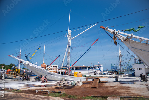 Wooden boats anchor at Paotere Traditional Harbor  Makassar  South Sulawesi  Indonesia