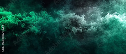 Abstract green smoke on a black background  forming a banner design with a dark green color of ink in water  illustrating a black and white concept in a smoky room.