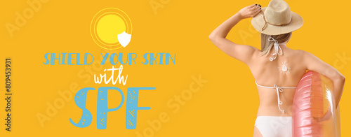 Young woman with sun made o...