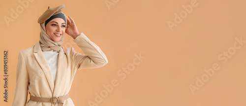 Stylish Muslim woman on bei...