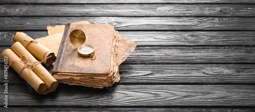 Old book with compass and s...