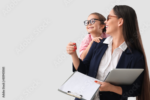 Little girl with her workin...