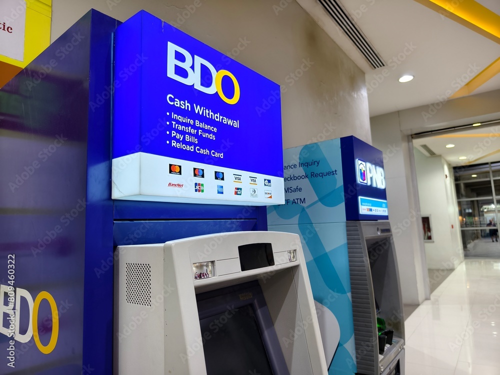 BDO and PNB ATM machines in a Manila mall offering various banking ...