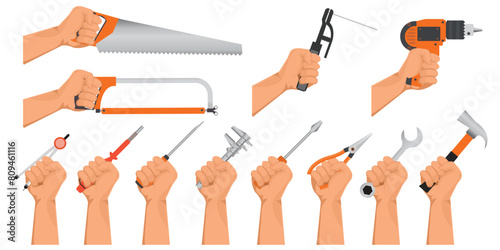 Hands holding construction tools.
