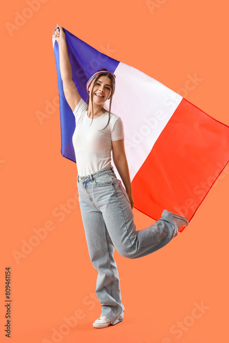 Young woman with flag of Fr...