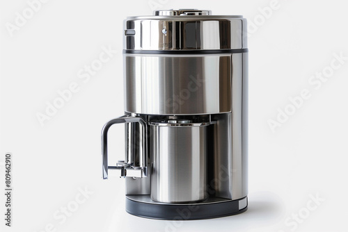 A countertop water purifier with a stainless steel finish and a multi-stage filtration system isolated on a solid white background.