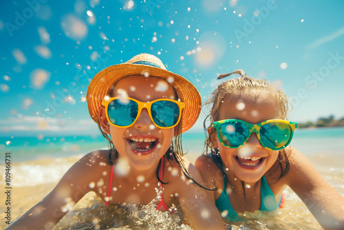 A joyful photo of two children in sunglasses, laughing and playing in the sea, perfectly capturing the essence of a fun-filled beach day