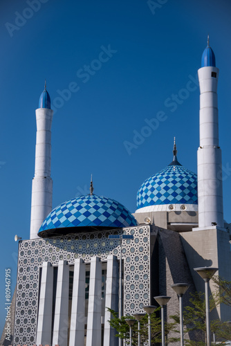 Amirul Mukminin Mosque, a floating mosque, is located at Losari Beach. A beautiful blue sky on the beach. photo
