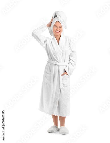 Young woman in bathrobe aft...