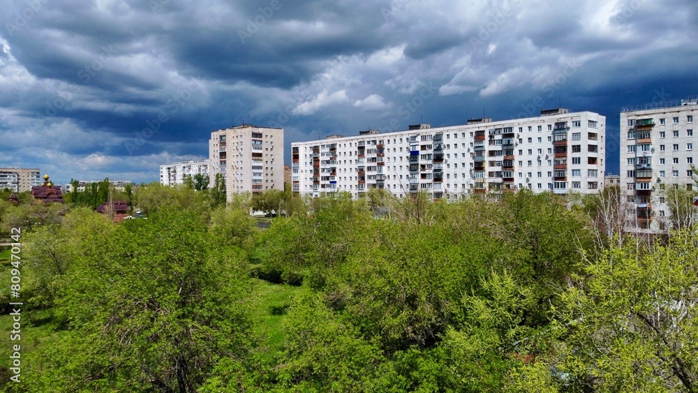 view of residential buildings in Orenburg from the park
