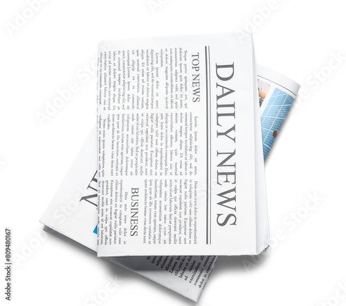 Different newspapers on white background photo