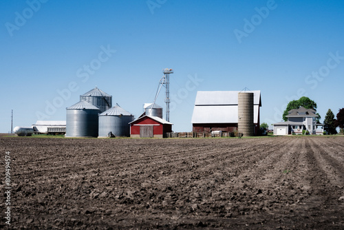 Rural Farm and Plowed Field