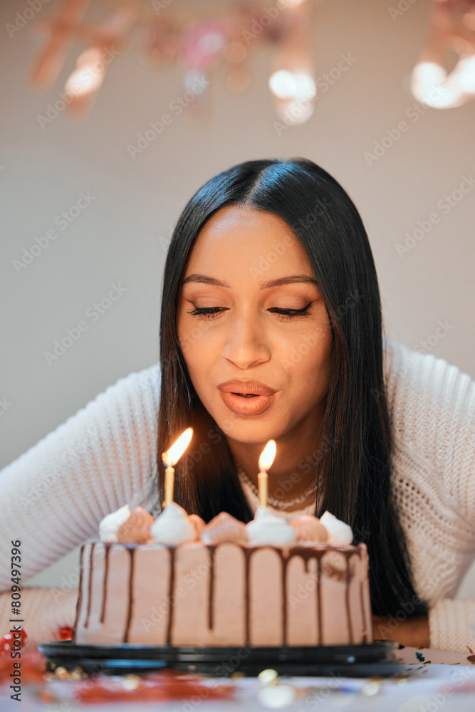 Birthday, candles and woman blow cake at party for celebration, surprise and present. Happy, flame and young female person with dessert food, sweet treat and fire for special event at apartment. Birthday, candles and woman blow cake at party for celebration, surprise and present. Happy, flame and young female person with dessert food, sweet treat and fire for special event at apartment.